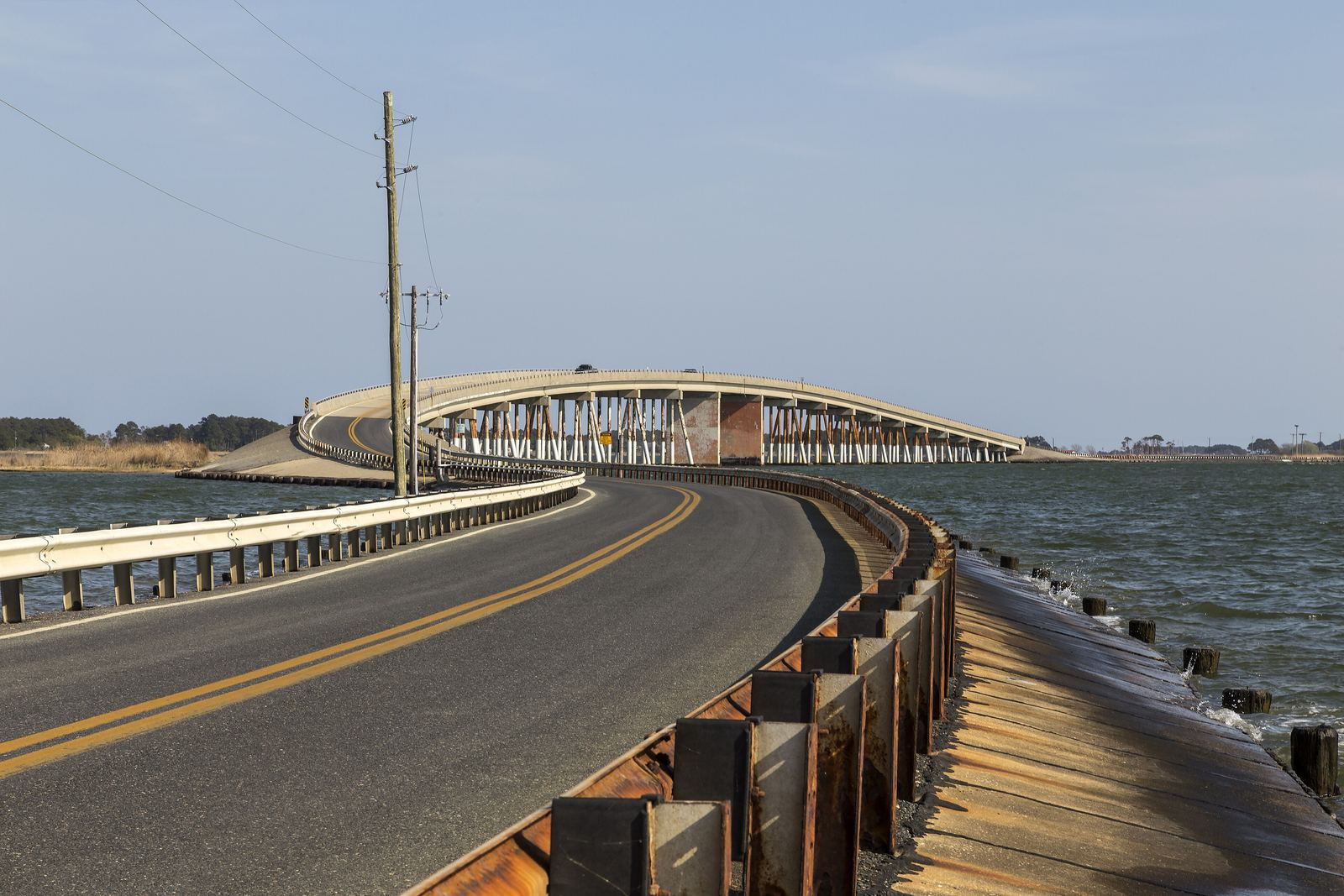 The arched Hoopers Island bridge crossing open water between Upper and Middle Hooper Island