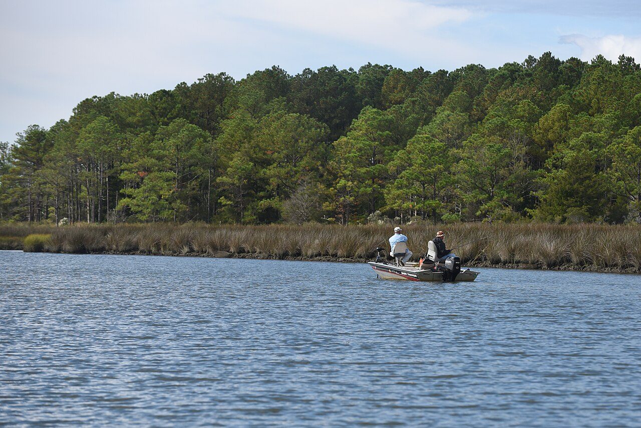 Anglers in a small boat on the water at Janes Island State Park, Somerset County, Maryland